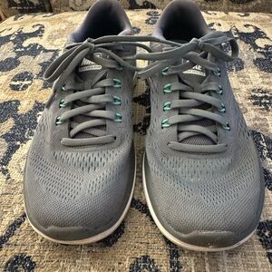 Nike Women’s Gray Athletic Shoes with Teal Accents